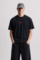 Blessed oversized black tee with embroidered chest logo
